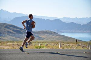 man running blue horizon